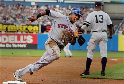 Carlos Gomez races home to score the Mets first run